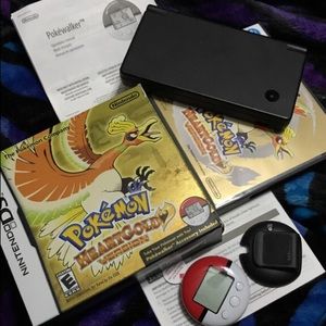 Black nintendo ds i with game